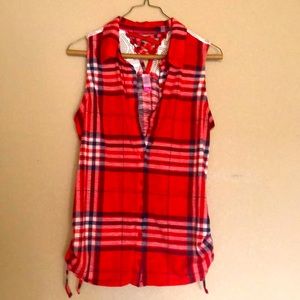 Sleeveless, button down shirt